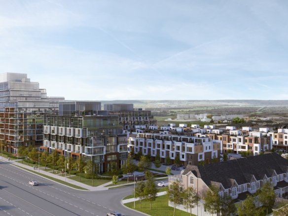 Modern rear-lane townhomes at Elements Milton with double-car garages