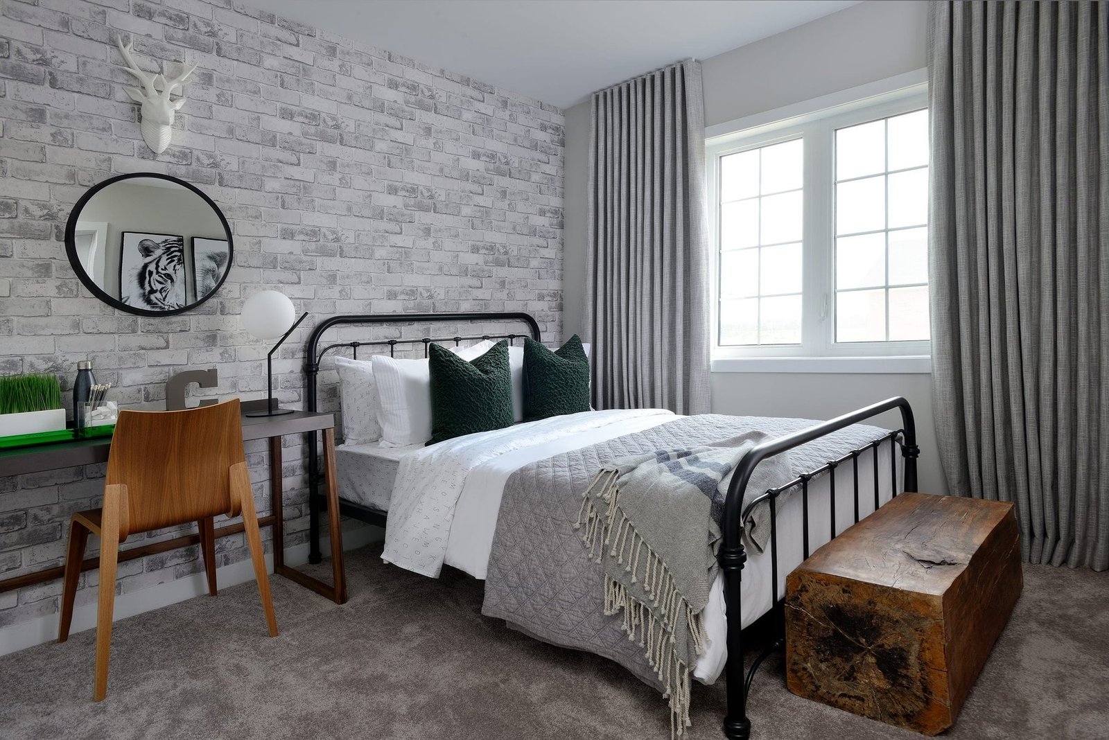 Comfortable and light-filled bedroom suite at Empire Avalon