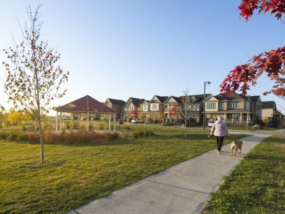 Spacious community park, children playground, and walking trail network at Empire Avalon