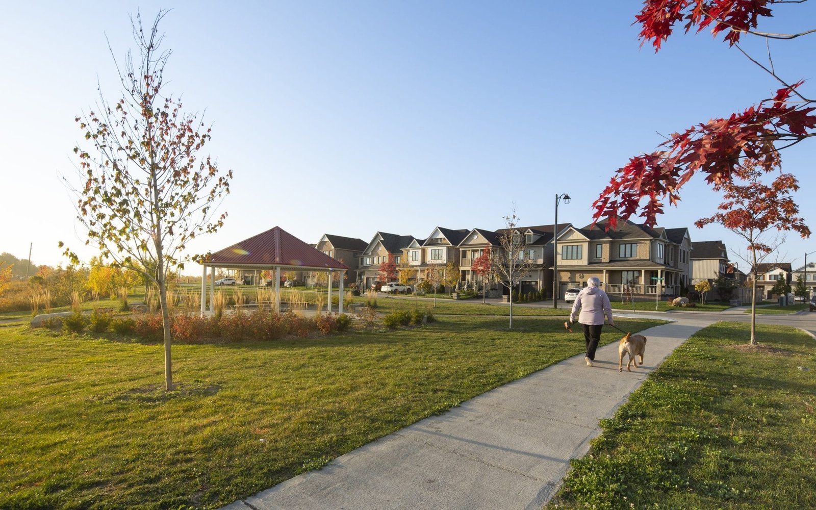 Spacious community park, children playground, and walking trail network at Empire Avalon