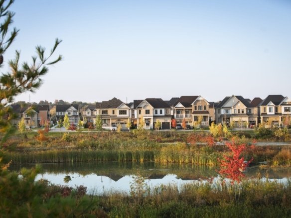 Scenic community pond and protected natural wetlands at Empire Avalon