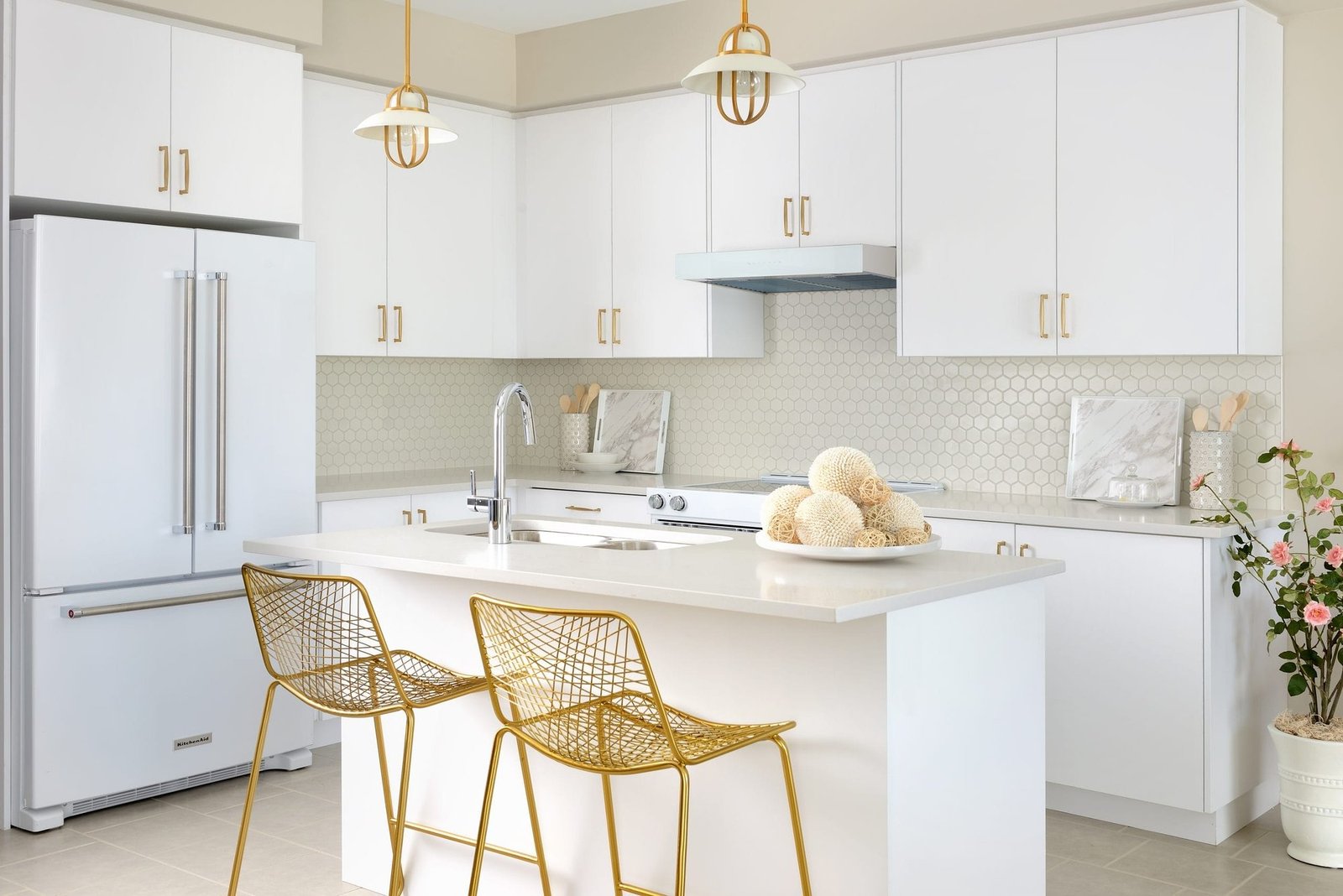 Open-concept modern kitchen with premium quartz countertops at Empire Avalon
