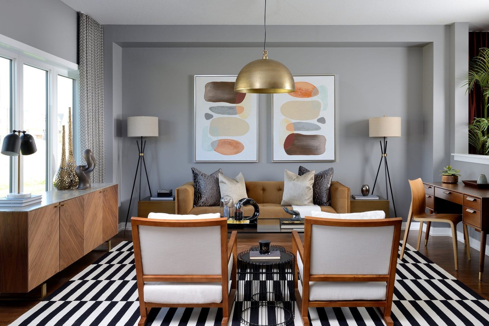 Bright and elegant great room living space at Empire Avalon
