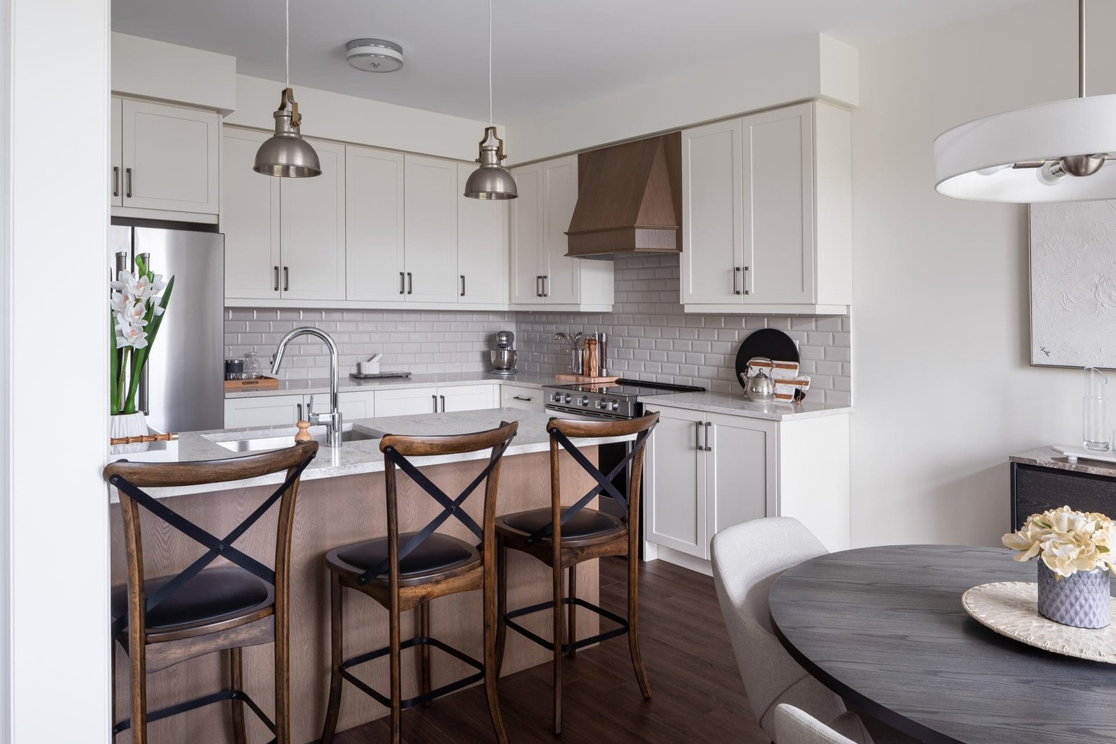 Modern kitchen layout featuring custom cabinetry and premium appliances at Empire Calderwood