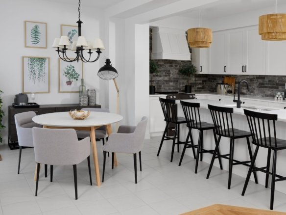 Gourmet kitchen with custom island, quartz countertops, and premium finishes at Empire Canals