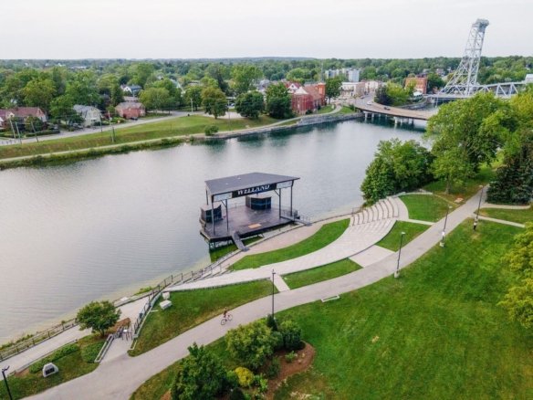 Family-friendly streetscape with completed townhomes and single-family residences at Empire Canals