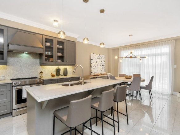 Relaxing primary bedroom suite with large walk-in wardrobe and luxury finishes at Empire Legacy