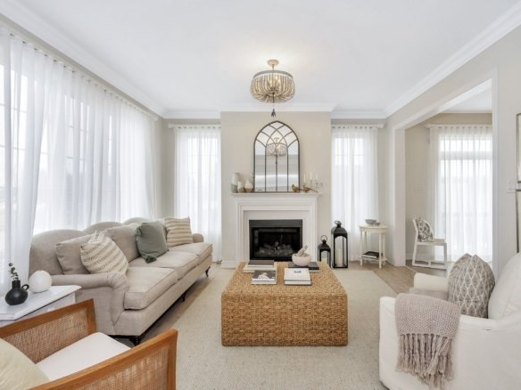 Sunlit open-concept living and dining layout in the Vibrant model home at Empire Legacy in Thorold