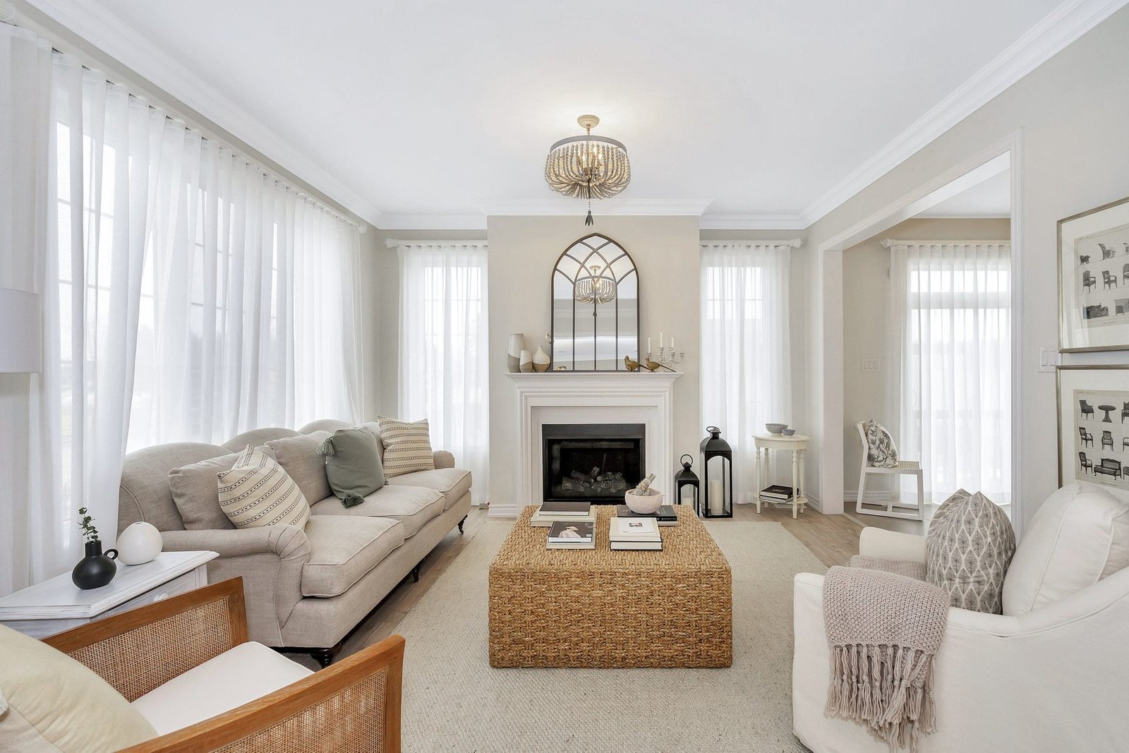 Sunlit open-concept living and dining layout in the Vibrant model home at Empire Legacy in Thorold